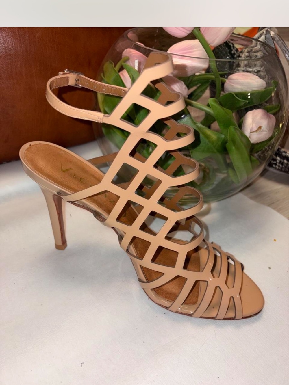 Vicenza caged stiletto sandals feature a patent beige or nude finish SIZE 40